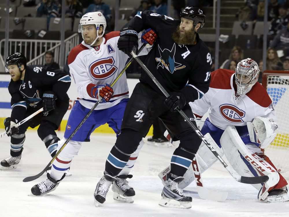 Montreal Canadiens' Shea Weber, front left, and goalie Carey Price, right, defend San Jose Sharks' Joe Thornton (19) during the first period of an NHL hockey game Friday, Dec. 2, 2016, in San Jose, Calif. At left is Sharks' Joe Pavelski (8).